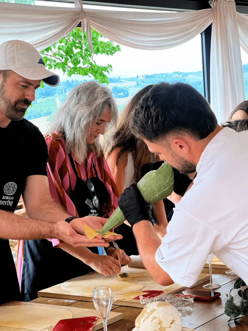 Guests rolling fresh pasta at The Chef’s Table class in our Florence kitchen