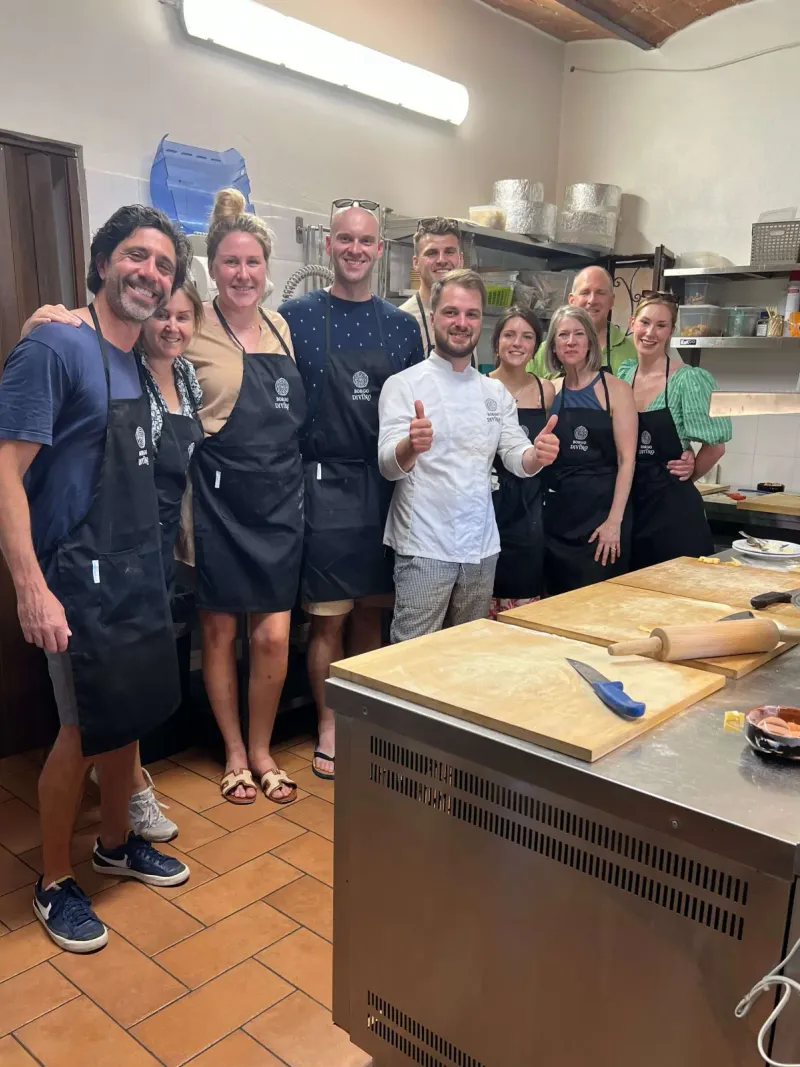 Guests rolling fresh pasta at The Chef’s Table class in our Florence kitchen
